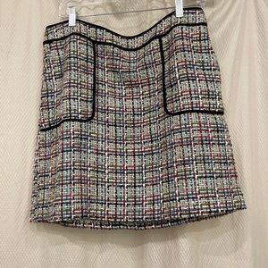 Tweed plaid mini skirt with front pockets